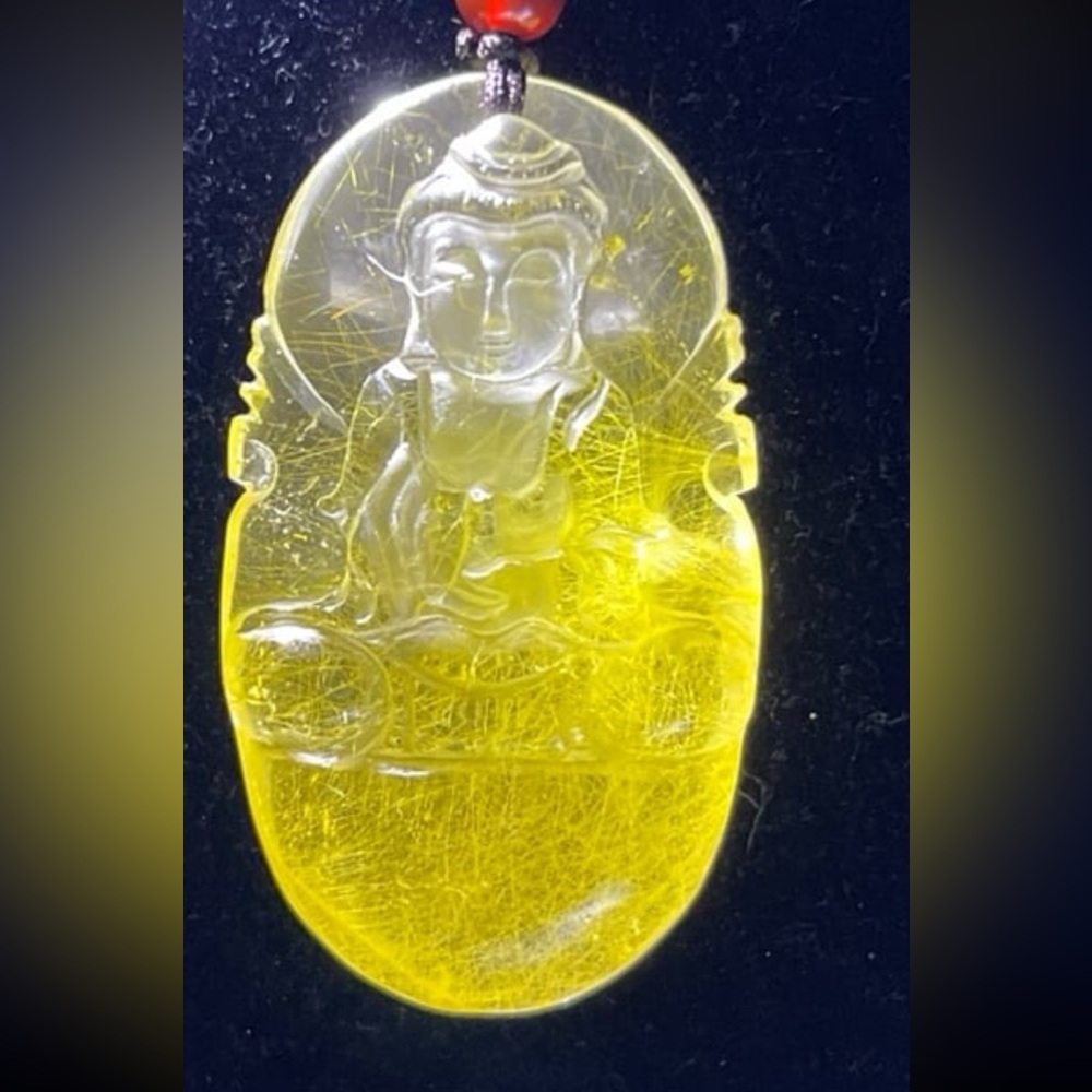 Unusual Rutilated Citrine Buddha Pendant.